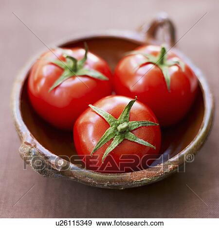 Stock Photo - Tomatoes in bowl. Fotosearch