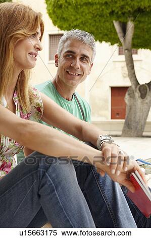 Tourist couple in city street View Large Photo Image Stock Photography - Tourist couple in city street. Fotosearch