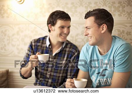 Two young people hanging out View Large Photo Image Stock Image - Two young people hanging out. Fotosearch