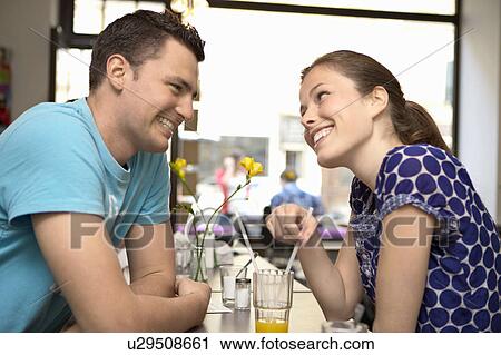 Two young people hanging out View Large Photo Image Stock Image - Two young people hanging out. Fotosearch