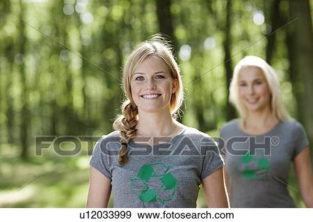 Stock Photo - Two young women in nature. Fotosearch