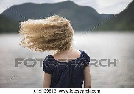 Wind in her hair View Large Photo Image Stock Image - Wind in her hair. Fotosearch