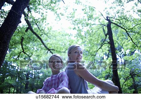 Woman and daughter in forest View Large Photo Image Picture - Woman and daughter in forest. Fotosearch
