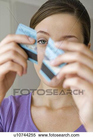 Woman destroys credit card View Large Photo Image Stock Photography - Woman destroys credit card. Fotosearch