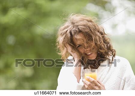 Woman having breakfast View Large Photo Image Stock Image - Woman having breakfast. Fotosearch