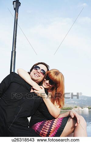 Woman holding man in headlock View Large Photo Image Stock Image - Woman holding man in headlock. Fotosearch
