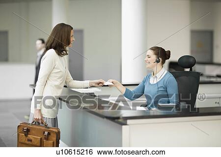 Woman in a lobby View Large Photo Image Stock Photograph - Woman in a lobby. Fotosearch
