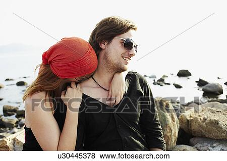 Woman kissing man to neck View Large Photo Image Stock Photo - Woman kissing man to neck. Fotosearch
