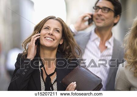 Woman on the phone View Large Photo Image Stock Image - Woman on the phone. Fotosearch