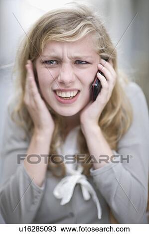 Stock Image - Woman on the phone. Fotosearch