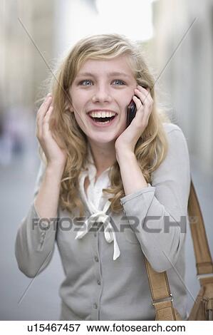 Woman on the phone View Large Photo Image Stock Photo - Woman on the phone. Fotosearch