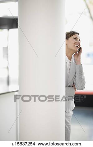 Woman phoning View Large Photo Image Picture - Woman phoning. Fotosearch
