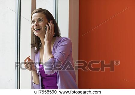 Woman phoning View Large Photo Image Stock Image - Woman phoning. Fotosearch