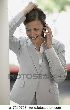 Woman phoning View Large Photo Image Stock Photo - Woman phoning. Fotosearch