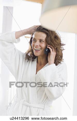 Stock Photograph - Woman phoning. Fotosearch