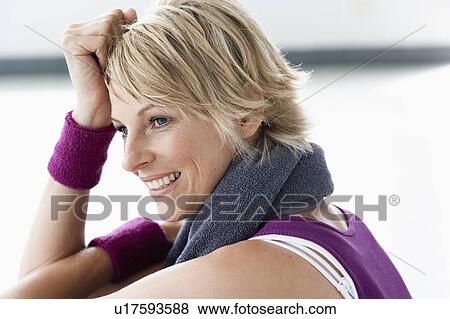 Woman relaxing after sports View Large Photo Image Stock Photo - Woman relaxing after sports. Fotosearch