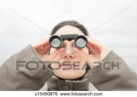 Stock Photo - Woman with Binoculars. Fotosearch
