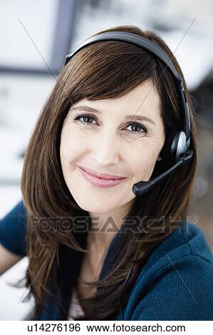 Woman with headset portrait View Large Photo Image Stock Photograph - Woman with headset portrait. Fotosearch