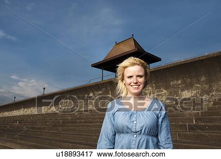 Woman with roof over head View Large Photo Image Stock Photo - Woman with roof over head. Fotosearch