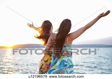Women at the beach View Large Photo Image Stock Photo - Women at the beach. Fotosearch