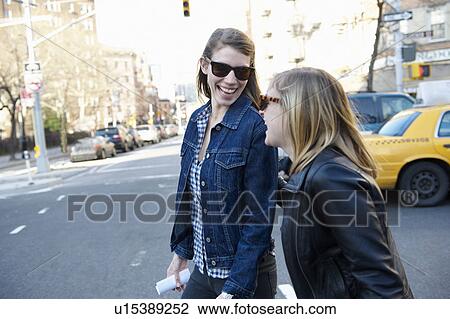 Women crossing the street View Large Photo Image Stock Image - Women crossing the street. Fotosearch