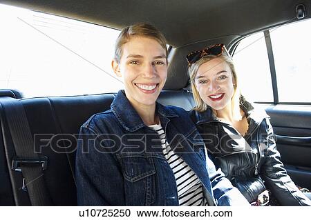 Women in a taxi View Large Photo Image Stock Image - Women in a taxi. Fotosearch