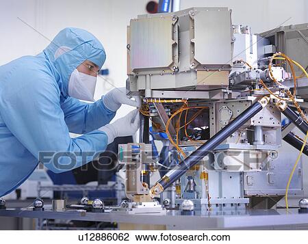 Worker building satellite dish View Large Photo Image Stock Image - Worker building satellite dish. Fotosearch