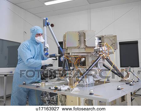 Worker building satellite dish View Large Photo Image Stock Photo - Worker building satellite dish. Fotosearch