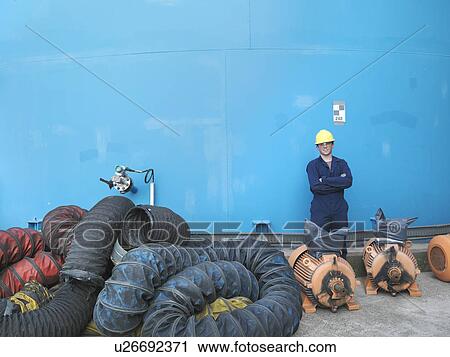 Worker in coal fired power station View Large Photo Image Stock Image - Worker in coal fired power station. Fotosearch