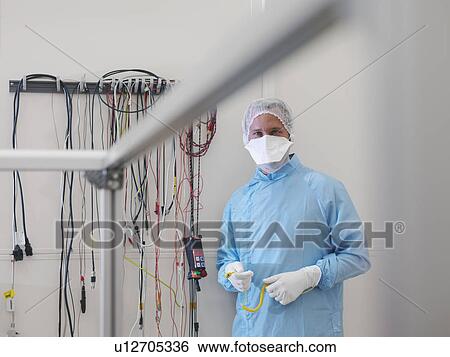 Worker in satellite testing station View Large Photo Image Stock Photograph - Worker in satellite testing station. Fotosearch