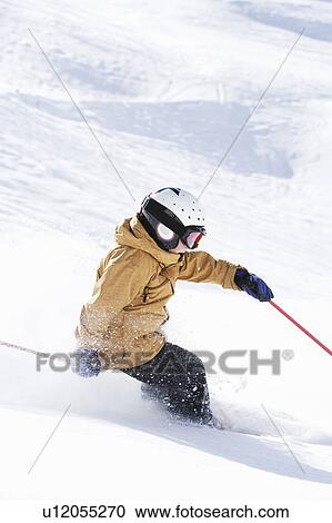 Stock Image - Young Boy skiing. Fotosearch