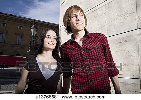 Young couple in the city View Large Photo Image Stock Image - Young couple in the city. Fotosearch