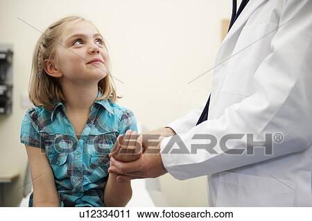 Young girl and doctor View Large Photo Image Stock Image - Young girl and doctor. Fotosearch