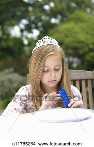 Young girl with tiara on View Large Photo Image Picture - Young girl with tiara on. Fotosearch