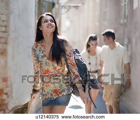 Young people travelling together View Large Photo Image Stock Photography - Young people travelling together. Fotosearch