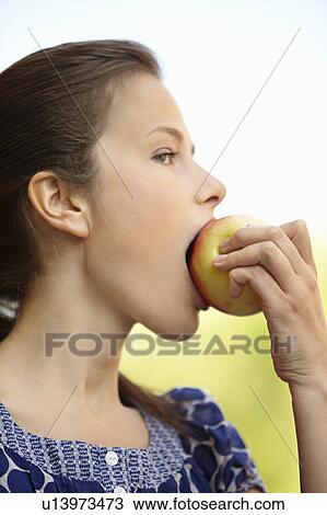 Young person in a fruit stall View Large Photo Image Stock Image - Young person in a fruit stall. Fotosearch
