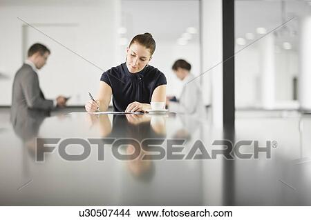 Picture - Young secretary. Fotosearch