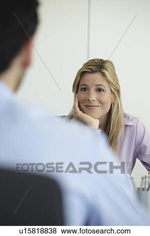 Young smiling business woman View Large Photo Image Stock Photo - Young smiling business woman. Fotosearch
