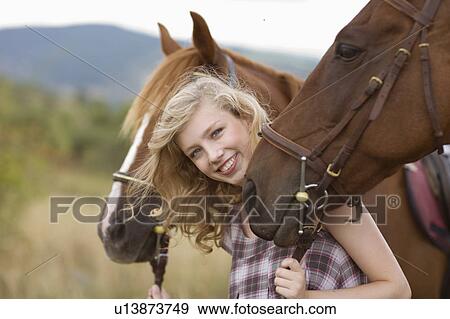 Young woman and horses View Large Photo Image Stock Photo - Young woman and horses. Fotosearch
