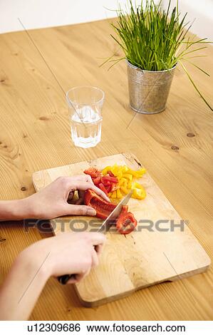 Young Woman at Home Preparing Food View Large Photo Image Stock Photograph - Young Woman at Home Preparing Food. Fotosearch