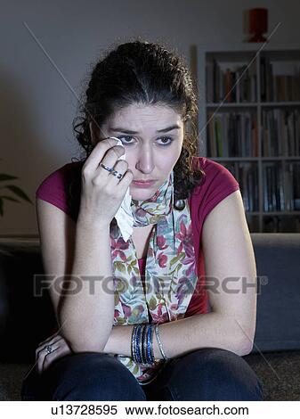 Young woman weeping watching television View Large Photo Image Stock Photography - Young woman weeping watching television. Fotosearch