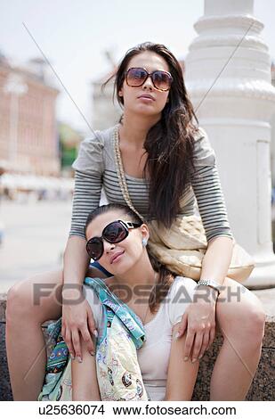 Young women travelling View Large Photo Image Picture - Young women travelling. Fotosearch