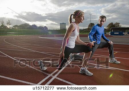 Stock Photo - 2 athletes training together. Fotosearch