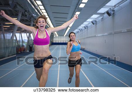 2 female athletes racing View Large Photo Image Stock Photography - 2 female athletes racing. Fotosearch