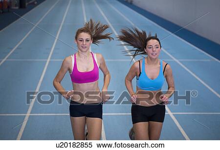 2 female athletes racing View Large Photo Image Stock Photography - 2 female athletes racing. Fotosearch