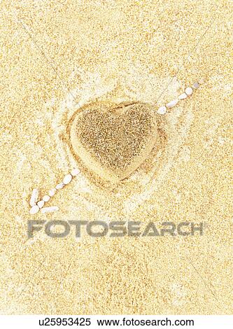 Arrow and heart in the sand View Large Photo Image Stock Photography - Arrow and heart in the sand. Fotosearch