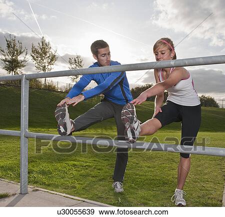 athletes stretching together View Large Photo Image Stock Photo - athletes stretching together. Fotosearch
