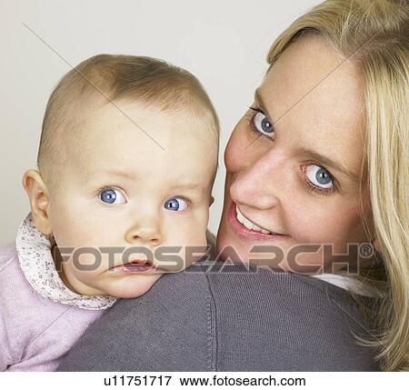 Stock Photo - Baby and mother. Fotosearch