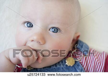 Stock Image - Baby boy close-up portrait. Fotosearch