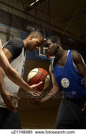 Basketball players had to head View Large Photo Image Stock Photography - Basketball players had to head. Fotosearch